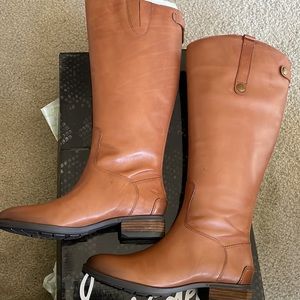 NWB beautiful brown leather wide calf boots. Great addition to any wardrobe.